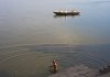 washing and praying, in the holy river Ganga, India 09..jpg